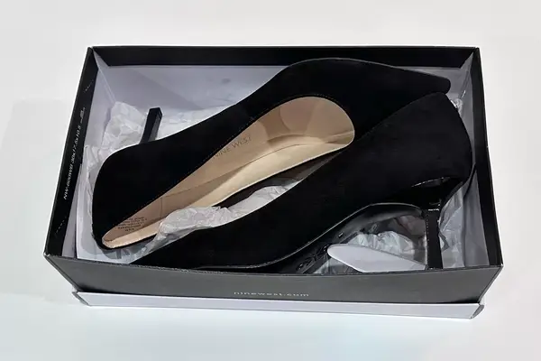 Nine West Kuna 9x9 Pointy Toe Pumps inside of the shoe box with the wrapping