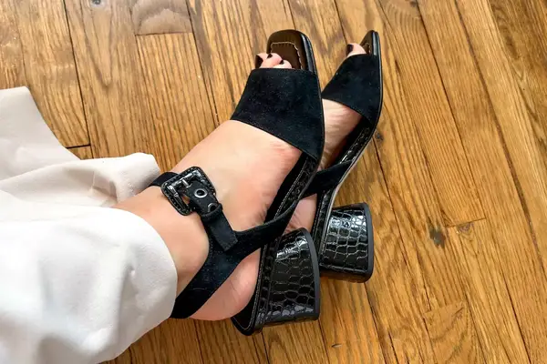 A person wearing the Donald Pilner Aaro Sandals