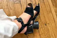 A person wearing the Donald Pilner Aaro Sandals