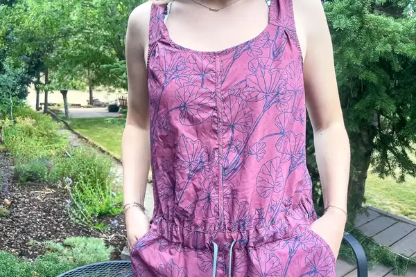 Person wearing a Flylow Tucker Jumpsuit in an outdoor setting
