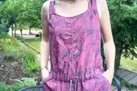 Person wearing a Flylow Tucker Jumpsuit in an outdoor setting