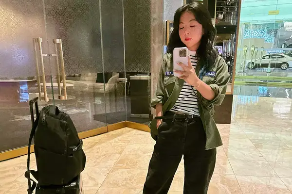 lululemon Backpack Atop Suitcase