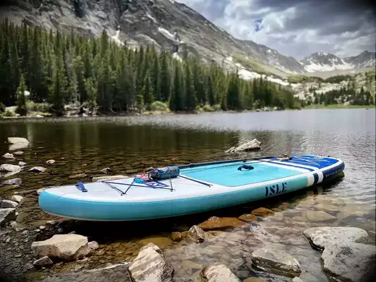The Isle Pioneer 2.0 Inflatable Stand Up Paddle Board inflated in a lake
