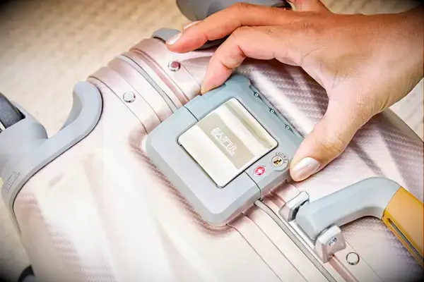 The latches on a Tumi suitcase