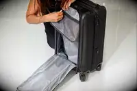 The interior of a Tumi suitcase