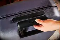 Handle of July Checked Plus Light suitcase