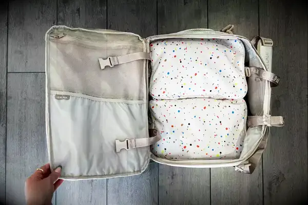 Calpak packing cubes inside a Calpak backpack