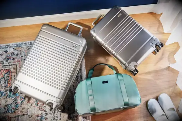 Three pieces of Arlo Skye luggage