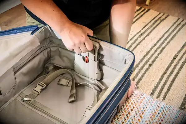The interior of an empty Briggs & Riley suitcase