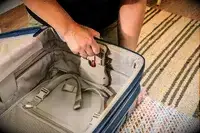 The interior of an empty Briggs & Riley suitcase