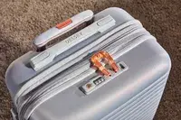 A close up of the top of the Delsey Cruise 3.0 Carry-on - 21