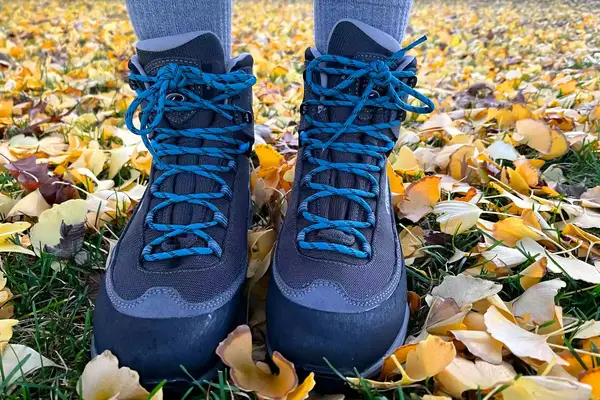 A person wears the Asolo Arctic GV Women’s Hiking Boots