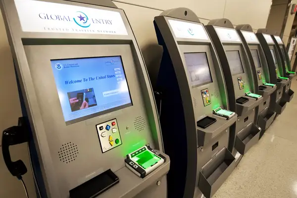 A bank of Global Entry kiosks at Dulles International Airport
