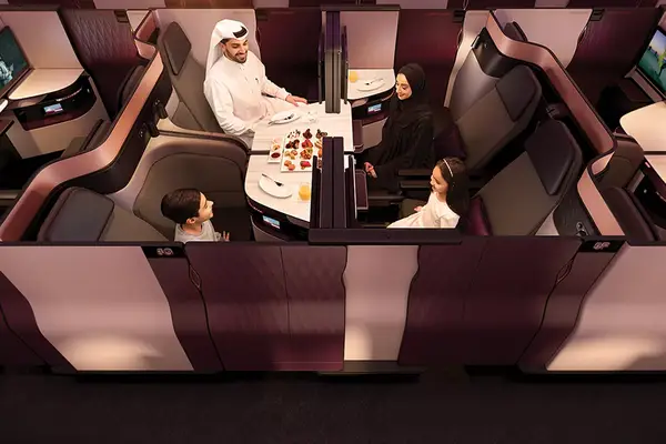 Family in Q-Suite on Qatar Airways