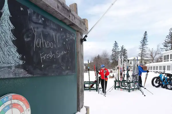 A nordic skier prepares to head out on the trails at the Bethel Village Ski Center 