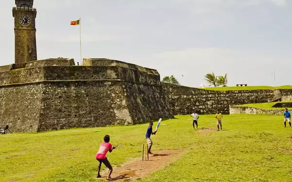Boys play cricket at Galle Fort, in southern Sri Lanka