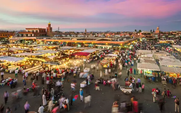 Jamaa el Fna market square in sunset, Marrakesh, Morocco
