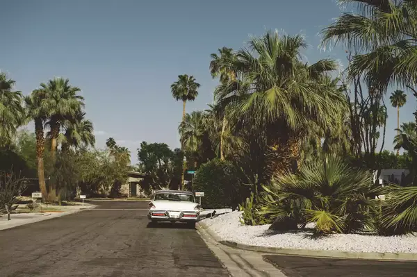 Vintage car parked on suburban road, Palm Springs, California