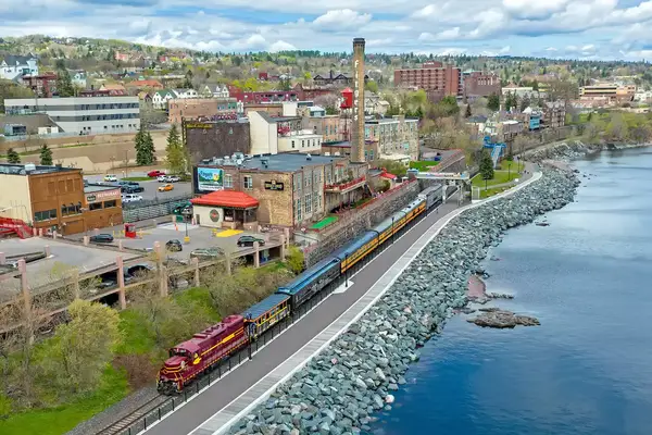 Aerial photo of the Duluth Zephyr train by the water
