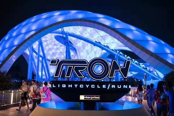 The exterior and entrance of the TRON Lightcycle ride at Disney