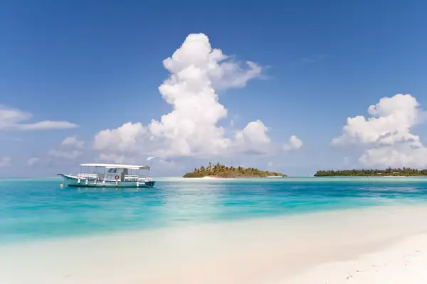 Boat off the coast of a beach