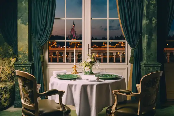 The view of the Disneyland Paris castle from a table at a park restaurant