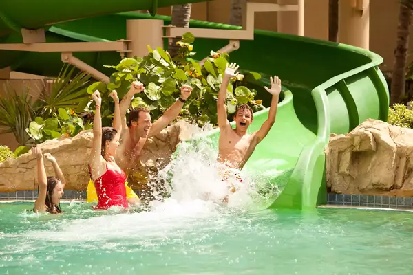 A family goes down the waterslide at Palm Beach Marriott Singer Beach