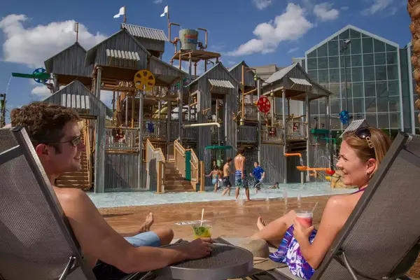 A family plays in the water park at Gaylord Palms Resort