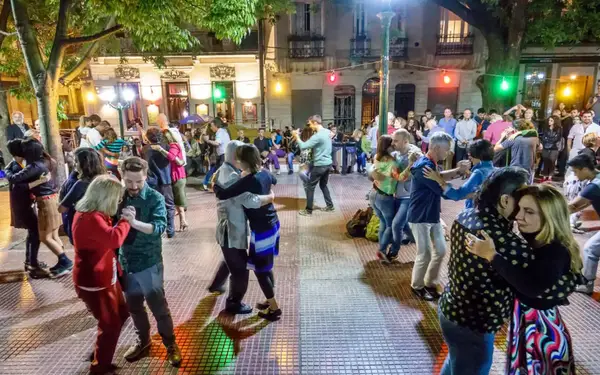 People dancing in the street in Buenos Aires, Argentina