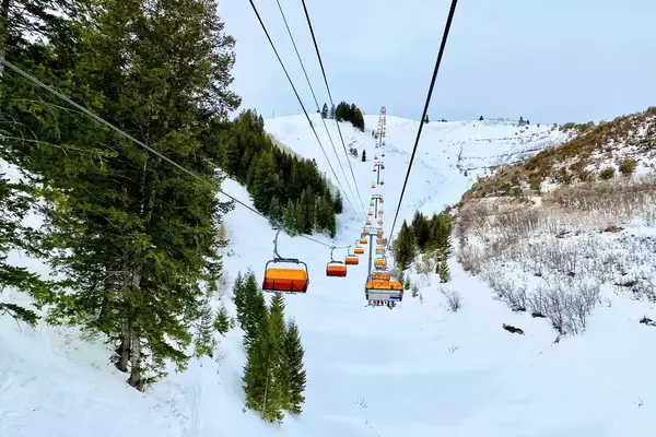 Orange chairlift Park City Utah ski resort