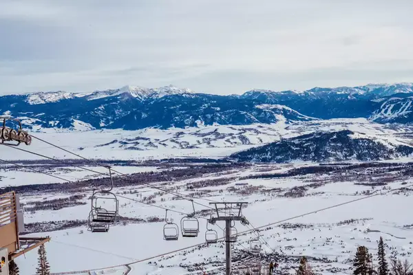 Ski lift with view of mountains in Jackson Hole, Wyoming