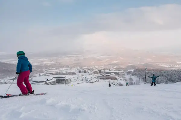 Skiing and Snowboarding in Grand Hirafu Niseko. Photos were taken at the slopes with views of Mt. Niseko-Annupuri and Mt. Yotei.