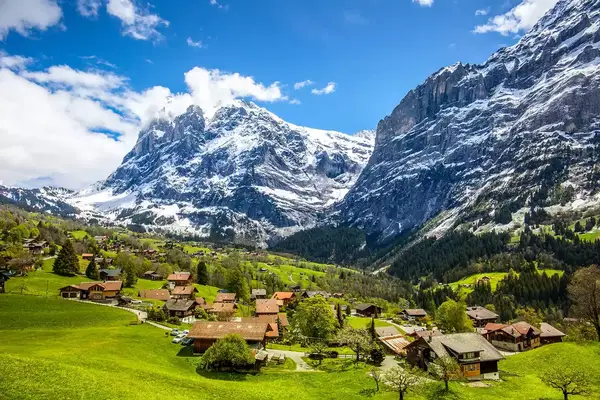 Panoramic view of Swiss village of Grindelwald and Mountain top of Wetterhorn,Bernese Overland, Switzerland