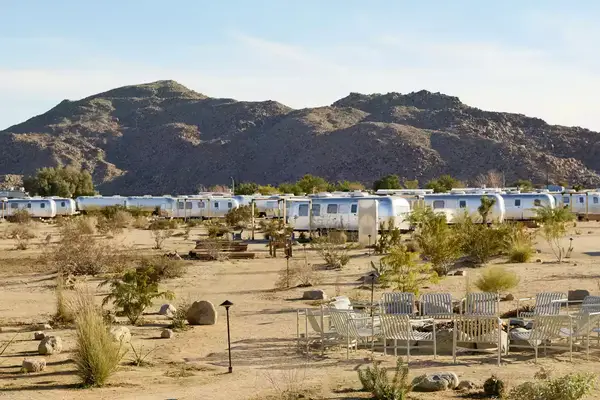 Silver Airstream trailers in the California desert