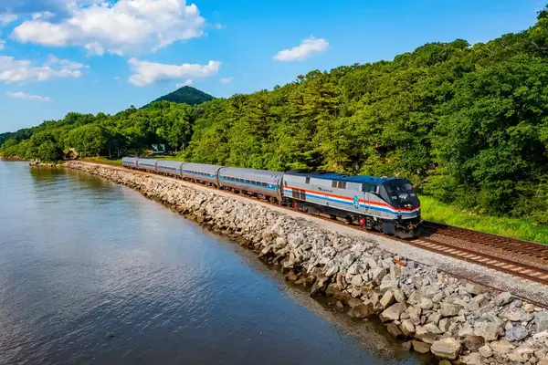 A train alongside a river