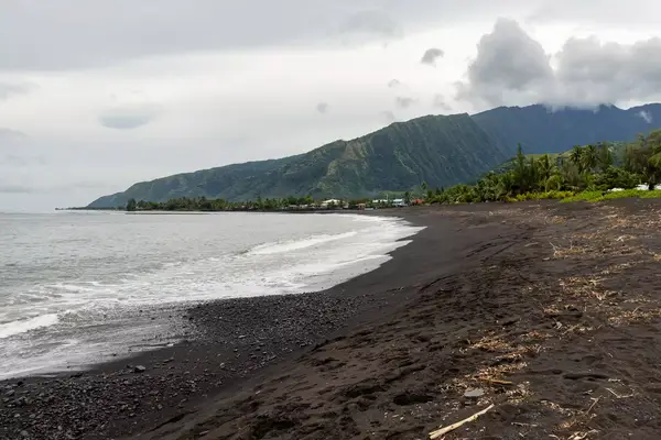 Black beach of Taharuu in Tahiti