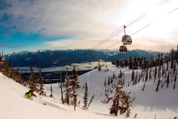 A skier under a ski lift.