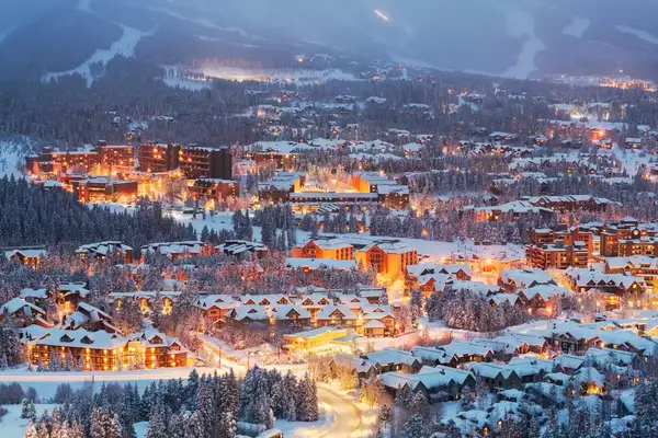 Snowy cityscape at night