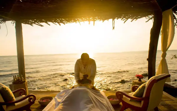 An outdoor wellness treatment by the shore at Song Saa Private Island