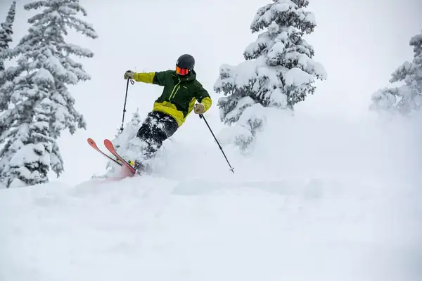 A skier going downhill