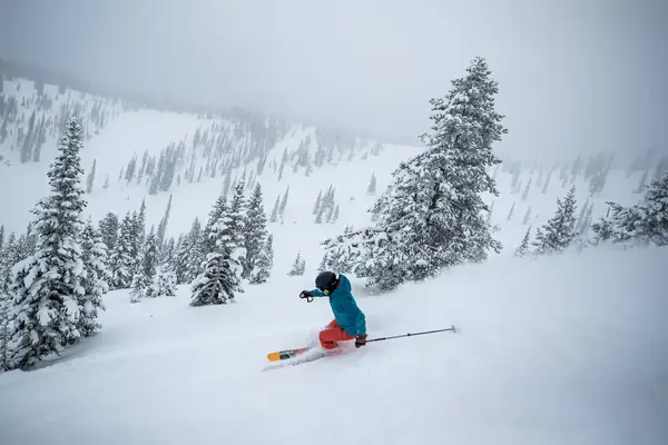 A skier going downhill