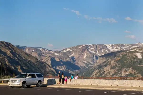 A truck pulled over looking at the view on the new Beartooth Highway in Montana 