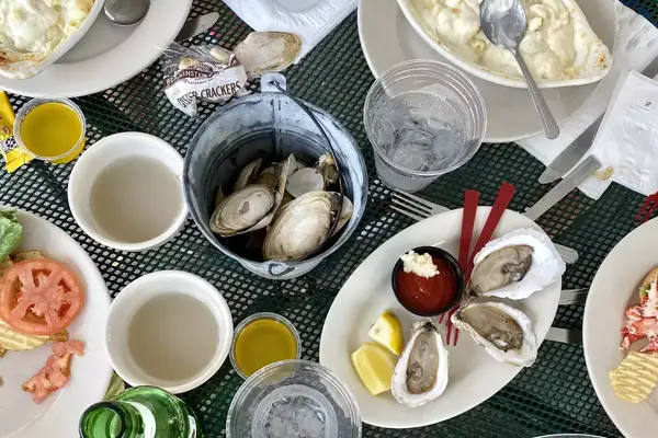 A table of oysters and seafood dishes from Joysters 