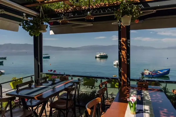 A restaurant terrace overlooking the water of Lake Ohrid