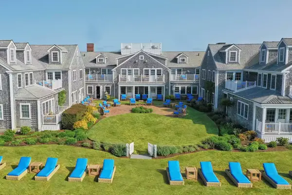 Exterior lawn and courtyard view of White Elephant in Nantucket