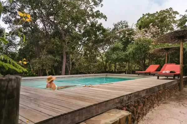 A woman swimming in a hotel pool in Brazil.
