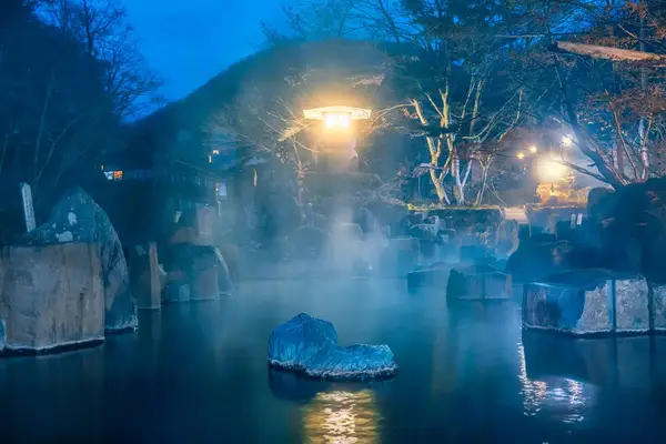 Traditional japanese outdoor hot spring at Takaragawa Onsen, Gunma prefecture, Japan during the night.