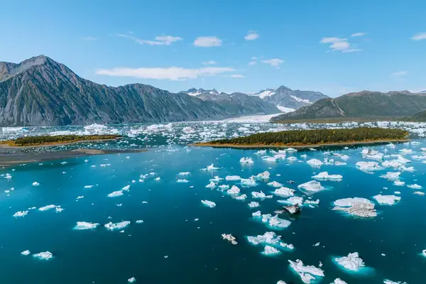 Mountain landscape and icebergs