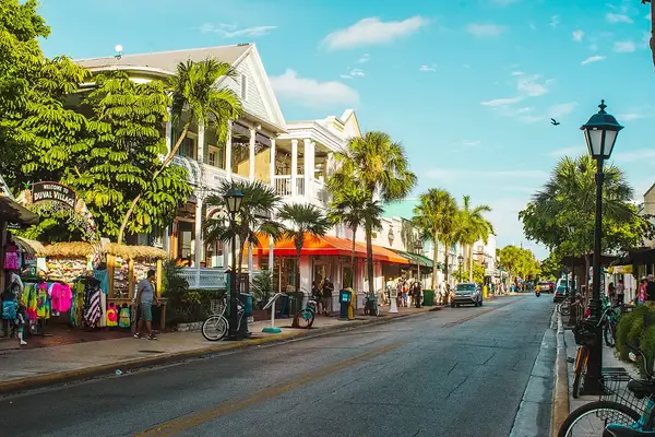 Colorful street lined with bikes