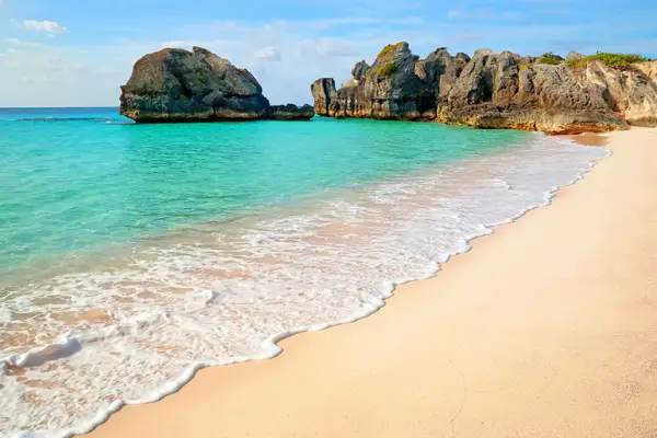Beautiful beach with waves in Warwick Long Bay in Bermuda